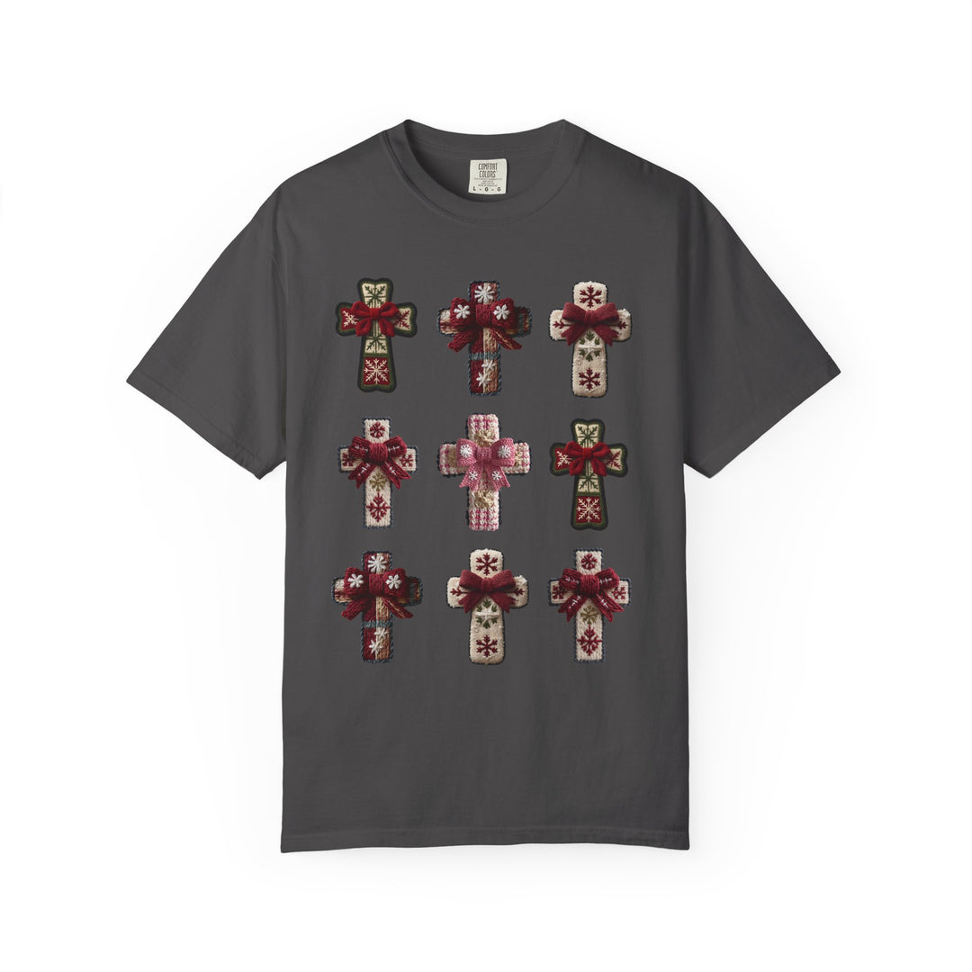 Dark-charcoal Crosses Tee featuring a 3×3 grid of holiday-themed cross patches with snowflake motifs and bows, offering luxurious comfort with its relaxed fit.