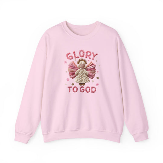 Glory to God Crew: Pale-pink crewneck sweatshirt featuring a yarn-style embroidered angel with pink wings and gold halo, surrounded by GLORY TO GOD in chunky pink lettering.