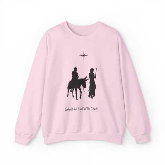 Unisex pink crewneck sweatshirt featuring a striking print of two men on horseback. Comfortable blend of polyester and cotton, ribbed collar, and no itchy seams. Available in various sizes.