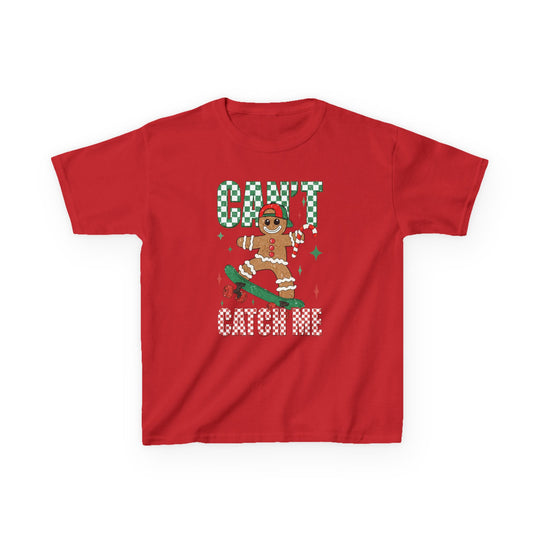 Can't Catch Me Kids Tee featuring a gingerbread on skateboard with candy-cane, festive sparkles, and checkerboard text. Durable, soft cotton, perfect for everyday wear.