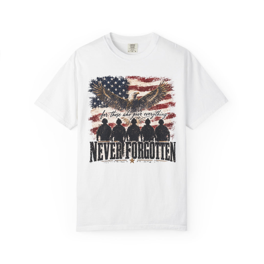 Never Forgotten Tee features a distressed American flag with a bald eagle and service members, promoting a tribute message. Made from soft, durable Comfort Colors cotton.