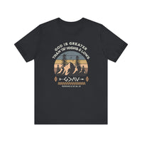 God is Greater Tee featuring a graphic design of mountains and trees on a black t-shirt, combining comfort and style with a classic unisex fit.