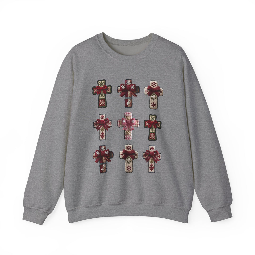 Heather-gray crewneck sweatshirt with a grid of decorative cross shapes featuring holiday motifs and red bows, showcasing Faith Family Designs' unique style.