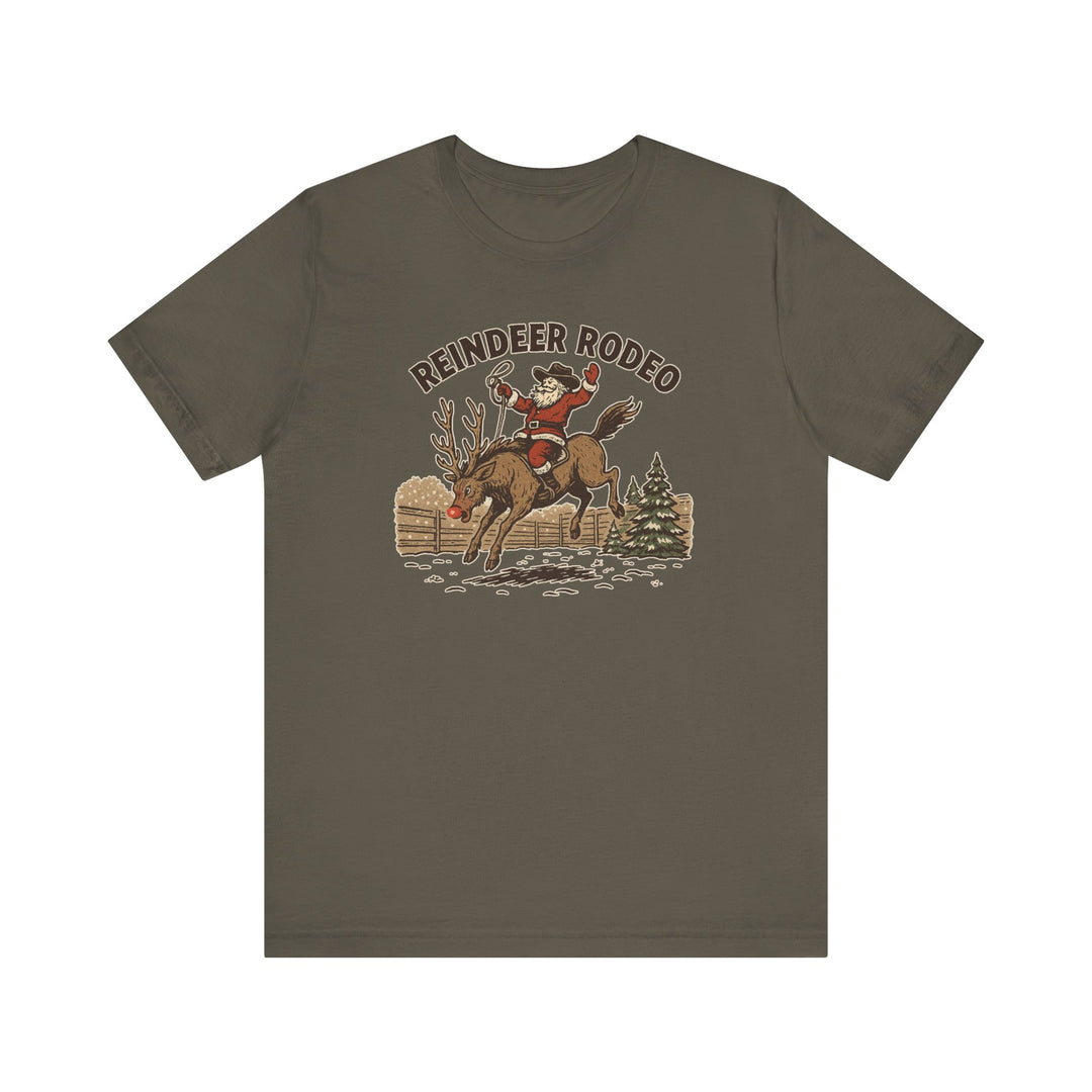 Reindeer Rodeo Tee featuring Santa riding Rudolph in a snowy corral, playful Christmas design on an olive-green unisex, soft cotton T-shirt.