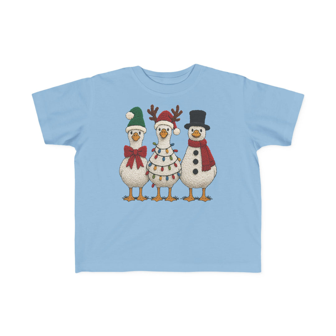 Christmas Ducks Toddler Tee featuring three festive birds dressed in holiday costumes, perfect for sensitive skin with its soft, durable cotton.
