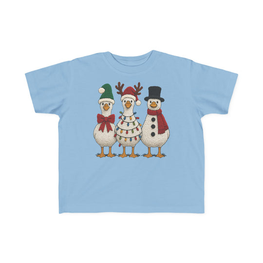 Christmas Ducks Toddler Tee featuring three festive birds dressed in holiday costumes, perfect for sensitive skin with its soft, durable cotton.