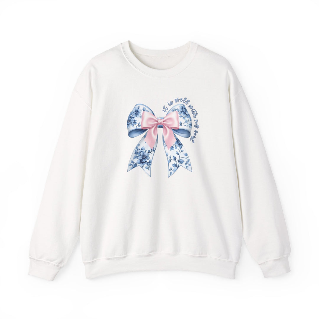 All is Well With My Soul Crew: White sweatshirt featuring a pastel bow with floral details and inspiring text, offering comfort with a polyester-cotton blend.