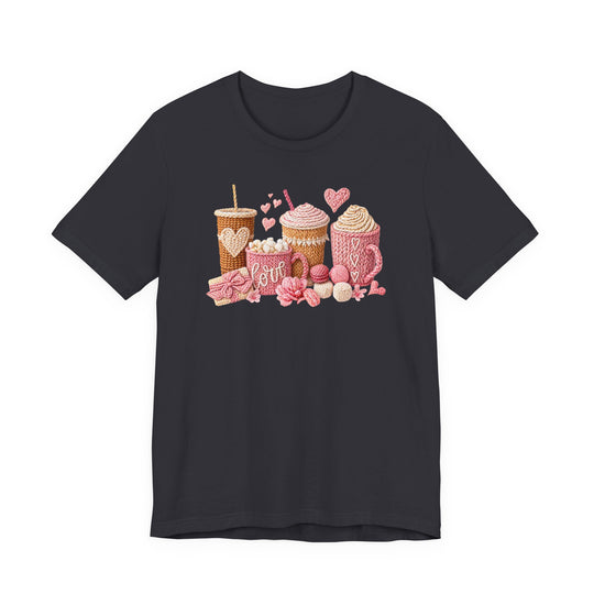 Coffee Love Tee featuring knit-look graphics of drinks, yarn, and hearts on a charcoal T-shirt, offering cozy vibes with a soft, comfortable fit.