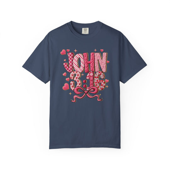 Navy-blue 3:16 Tee featuring a pink-and-red graphic with JOHN 3:16, decorated with hearts and a ribbon bow, ideal for stylish, faith-inspired wear.