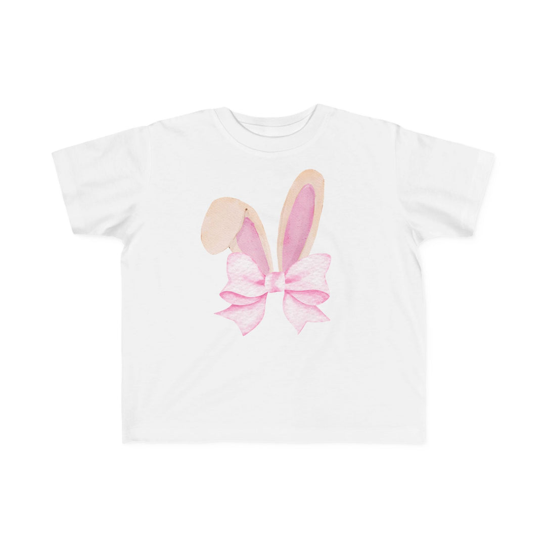 Bunny Bow Toddler Tee featuring pastel bunny ears and a pink bow graphic, designed for toddlers' comfort with soft, high-quality cotton fabric.