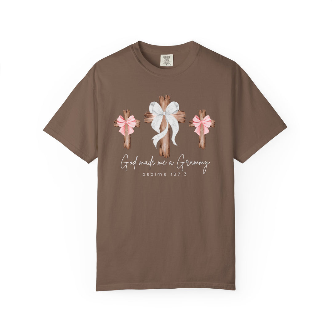 Brown Comfort Colors T-shirt featuring three rustic wooden crosses with bows and God made me a Grammy script, highlighting Psalms 127:3.