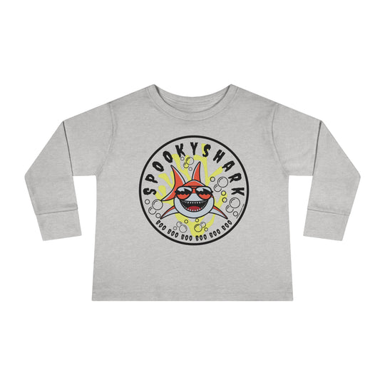 A toddler long-sleeve tee featuring a cartoon shark with sunglasses, designed for comfort and durability. Made from 100% combed ringspun cotton, with ribbed collar and EasyTear™ label. From 'Worlds Worst Tees'.