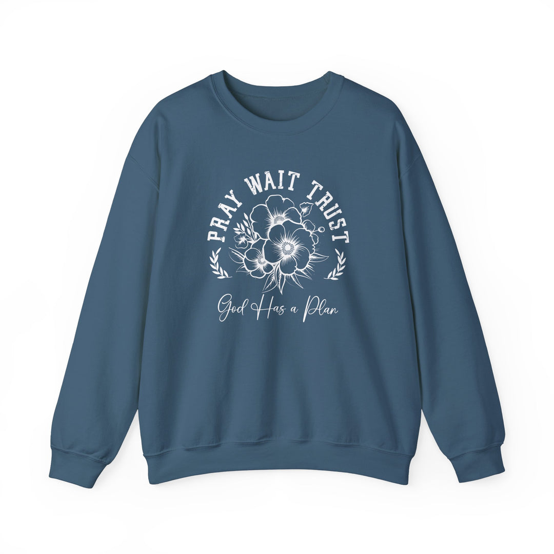 Pray Wait Trust Crew sweatshirt with white text and floral accents, ideal for comfort with its polyester-cotton blend and ribbed collar.