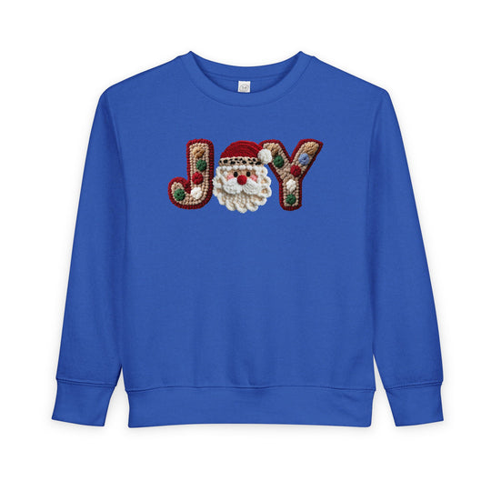 Joy Toddler Crew: Bright blue sweatshirt with JOY in multicolored embroidery, featuring a Santa face. Cozy, durable, ideal for toddlers.