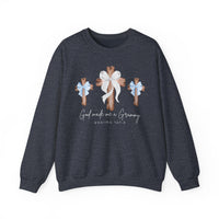 Dark-navy crewneck sweatshirt with three wooden crosses and bows, slogan God made me a Grammy, referencing Psalms 127:3. Comfortable, loose fit, polyester-cotton blend.