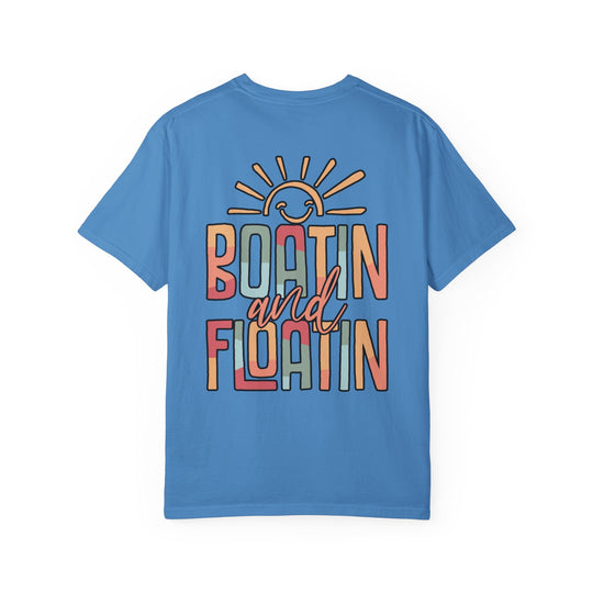Boatin and Floatin Tee, a relaxed-fit, garment-dyed t-shirt made from 100% ring-spun cotton, showcasing durable double-needle stitching and a classic crew neckline.
