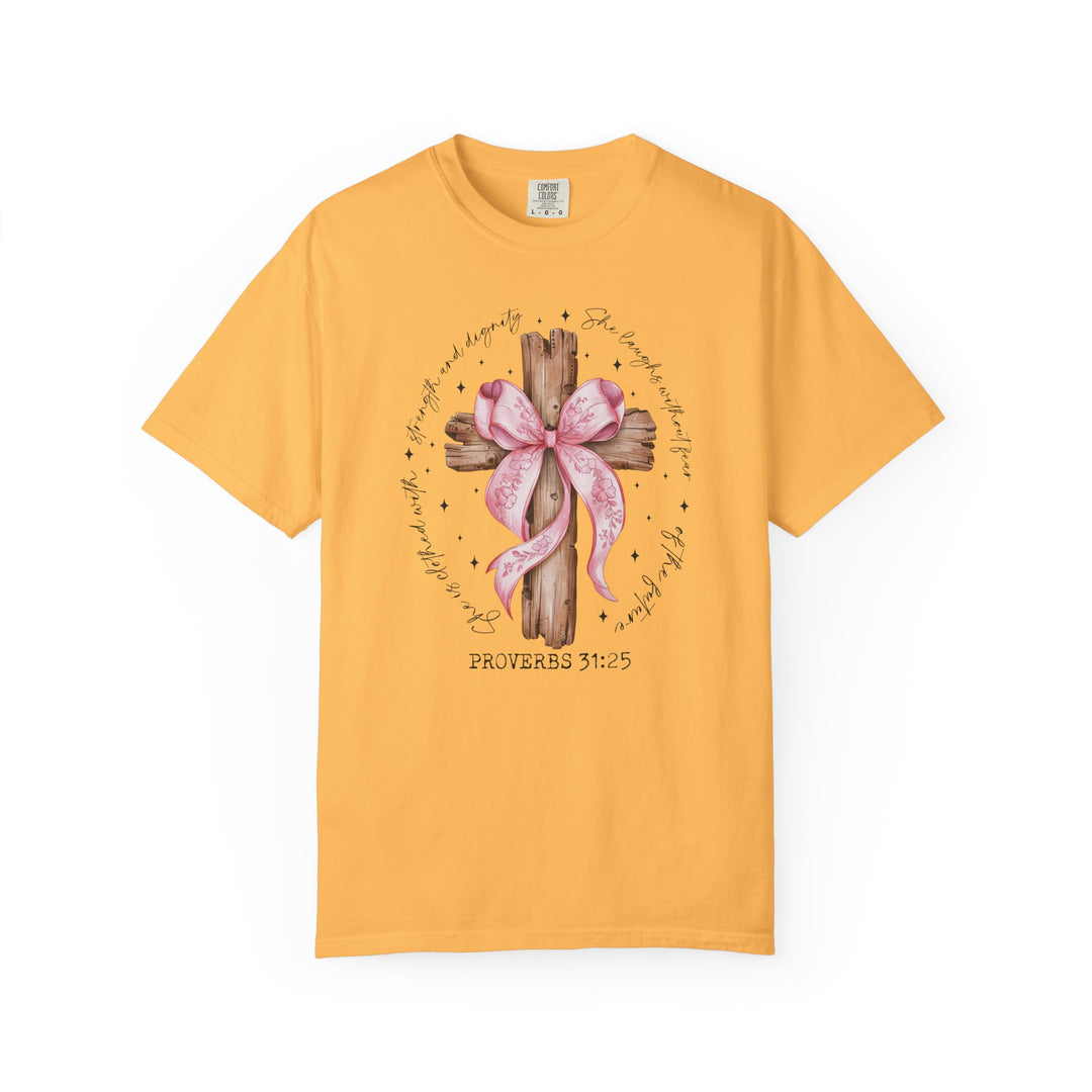Proverbs 31:25 Tee featuring a rustic wooden cross with a pink floral bow and inspirational scripture, surrounded by star-like sparkles. Available in multiple sizes for a relaxed fit.