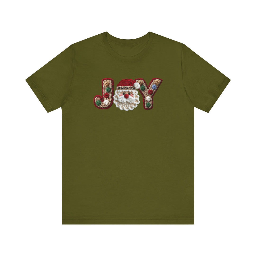 Olive-green Joy Tee with Santa design, featuring JOY in tufted yarn. Unisex, soft cotton, retail fit, available in various sizes. Ideal for Christmas-themed wear.