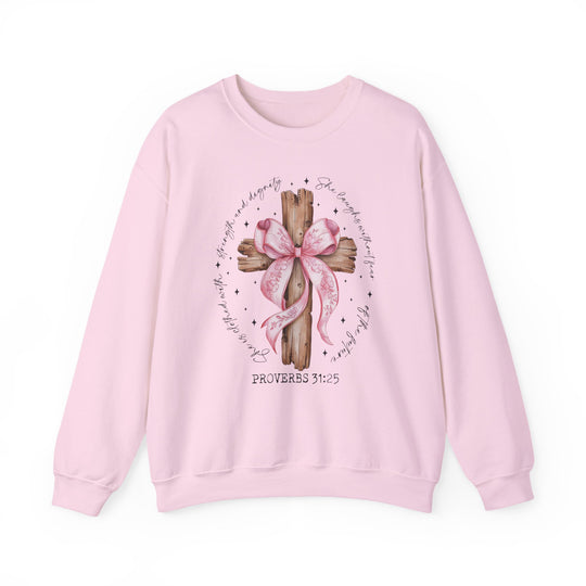 Proverbs 31:25 Crew: Women's pastel pink sweatshirt featuring a wooden cross with floral ribbon and script, ideal for comfort and faith-inspired style.