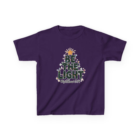 Be the Light Kids Tee featuring a Christmas tree design with BE THE LIGHT in green, colorful lights, and Matthew 5:14 reference on purple fabric.
