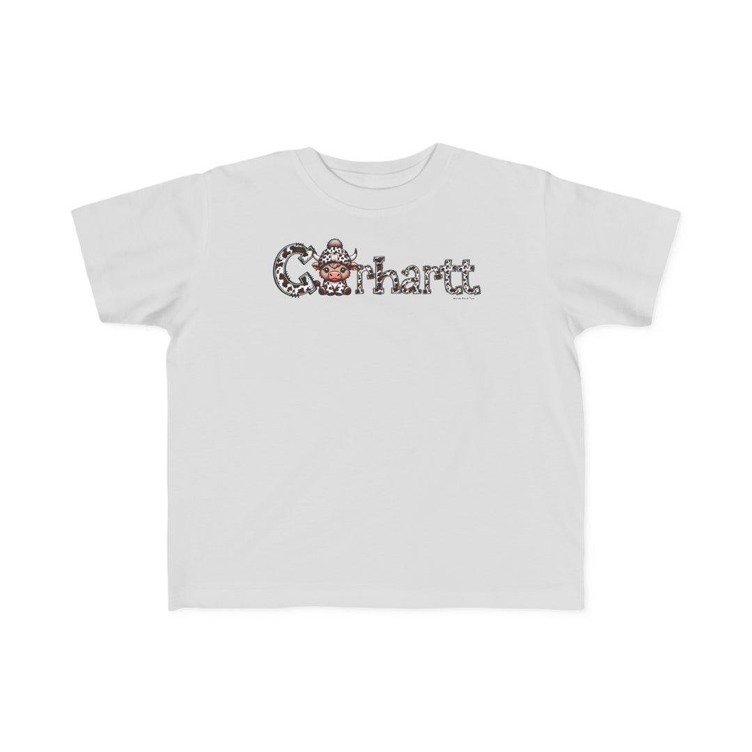 A white toddler tee featuring a cartoon cow with a hat, perfect for sensitive skin. 100% combed ringspun cotton, light fabric, tear-away label, classic fit. Sizes: 2T, 3T, 4T, 5-6T.