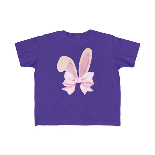 Bunny Bow Toddler Tee featuring stylized bunny ears with a pink ribbon bow, designed for comfort with soft, durable fabric ideal for toddlers.