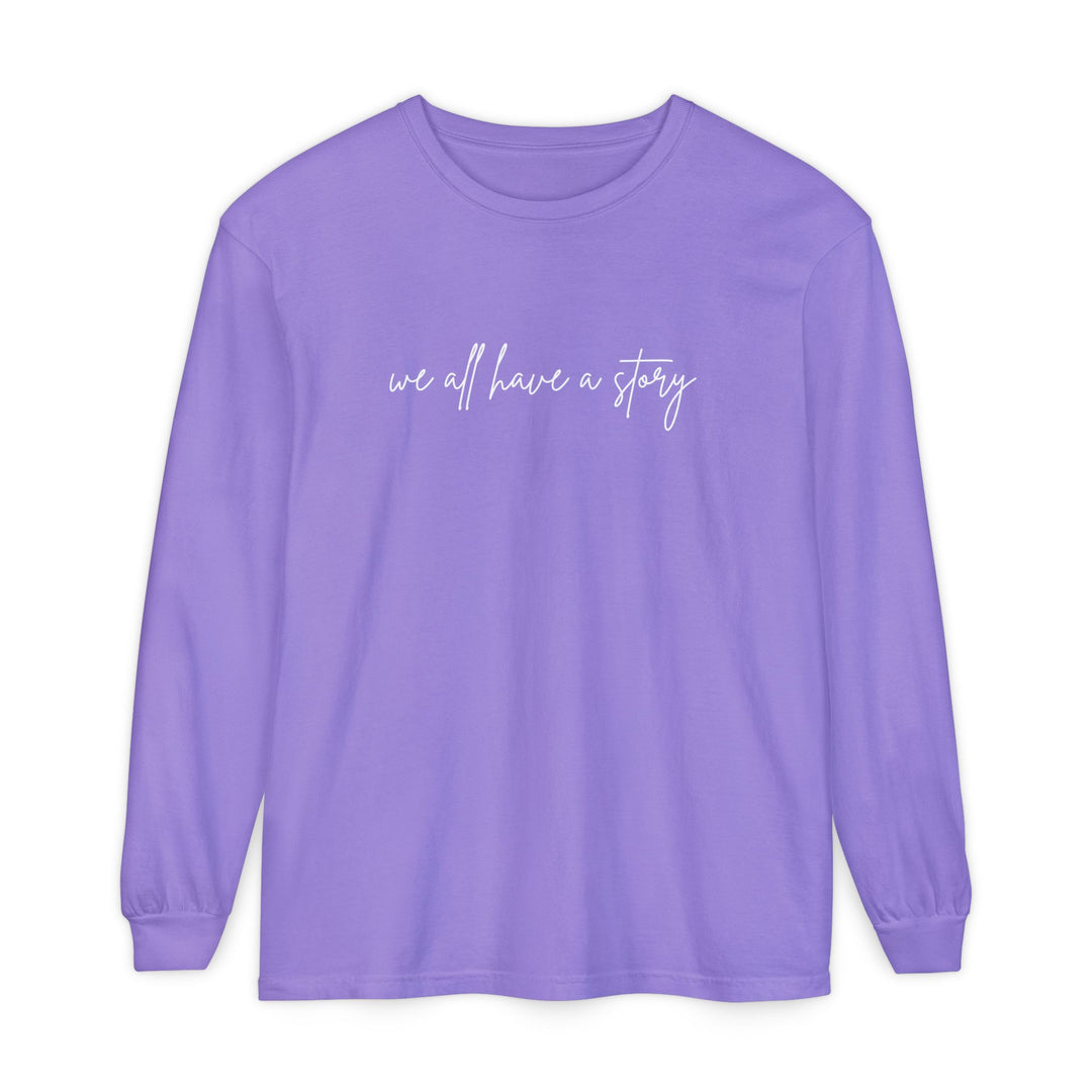 We all have a Story Long Sleeve Tee, featuring a relaxed fit and garment-dyed fabric, perfect for casual settings.