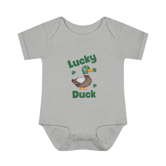 Lucky Duck Onesie: Grey baby bodysuit featuring a cartoon duck with clovers, designed for comfort with lap shoulders and soft ring-spun cotton.