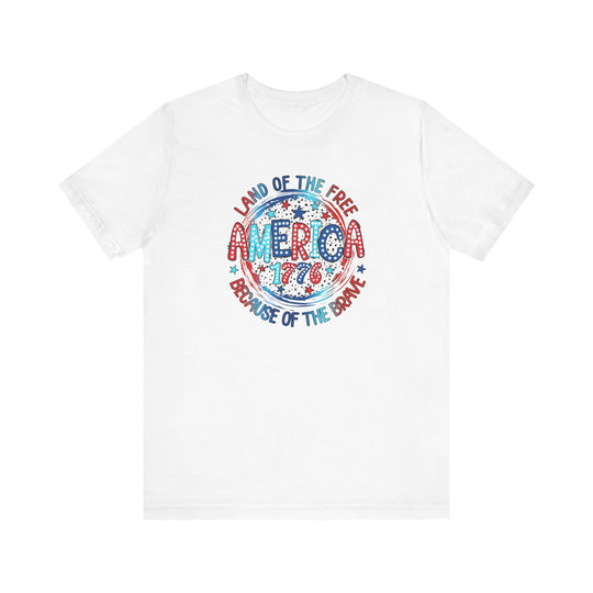 A classic unisex jersey tee featuring red, white, and blue text in a circle with stars, embodying the America 1776 Tee spirit. Made of 100% cotton, with ribbed knit collars and tear-away label.