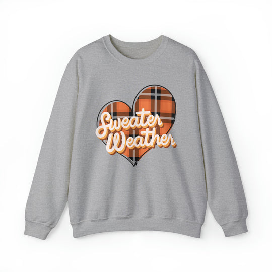 Unisex Sweater Weather Crew in grey with heart design. Polyester-cotton blend for comfort. Ribbed knit collar, no itchy seams. Medium-heavy fabric, loose fit, true to size. Sewn-in label.