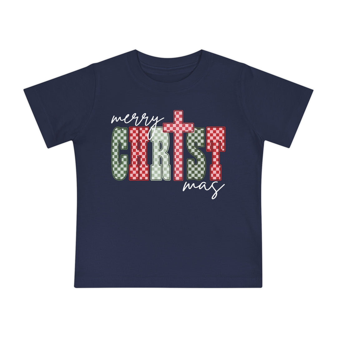 Christmas zBaby Tee in navy-blue featuring a festive “merry CHRISTmas” graphic with red-green-white checkerboard letters, designed for comfort and durability in sizes 3-24 months.