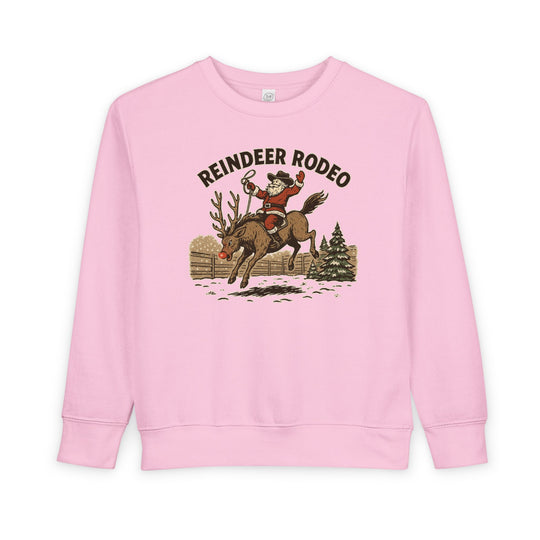 Reindeer Toddler Crew sweatshirt featuring Santa as a cowboy on a bucking reindeer with REINDEER RODEO text, perfect for cozy, festive toddler wear.