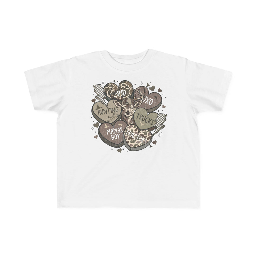 Boy Valentine Toddler Tee featuring a deer head with heart graphics and words like MAMA'S BOY. Made for toddlers with soft, durable cotton.