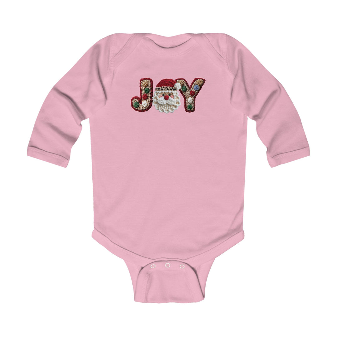 Joy Onesie: Pink infant bodysuit with JOY and Santa-face design, featuring envelope shoulders and snap closures for easy changing, made for comfort and durability.