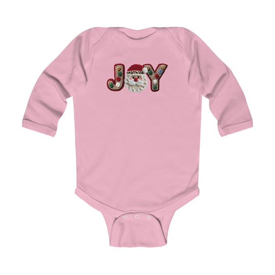 Joy Onesie: Pink infant bodysuit with JOY and Santa-face design, featuring envelope shoulders and snap closures for easy changing, made for comfort and durability.