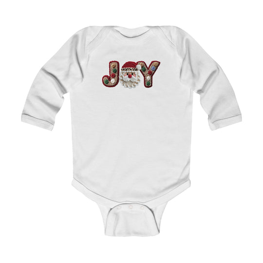 Infant long-sleeve Joy Onesie with festive JOY applique, featuring a Santa-face motif. Made from soft cotton with durable ribbed bindings and easy-change snaps.