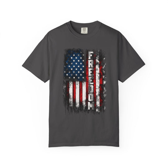 Freedom Tee featuring a distressed American flag graphic with FREEDOM vertically centered on a charcoal Comfort Colors short-sleeve, perfect for a relaxed, patriotic look.