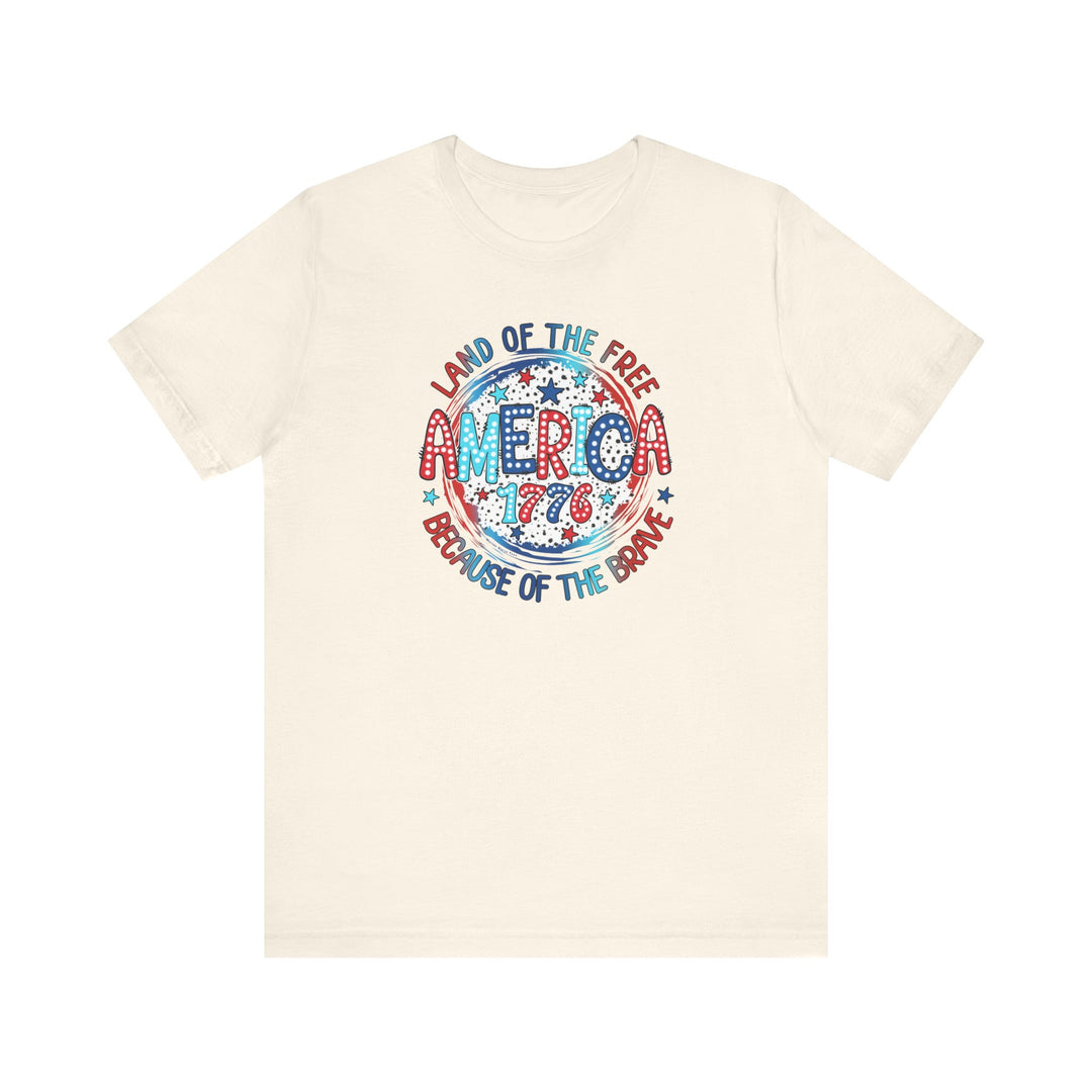 America 1776 Tee: Classic white unisex jersey t-shirt with red and blue text. 100% Airlume combed cotton, retail fit, tear away label. Soft, quality fabric for a comfortable fit. Worlds Worst Tees.