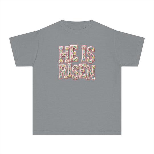 He is Risen Kids Tee with pastel floral text on gray, made from soft-washed combed cotton, perfect for active kids' comfort and style.