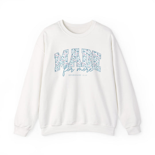White crew-neck sweatshirt with MADE in floral pattern, for more script, and EPHESIANS 2:10 reference, embodying Faith Family Designs' Christian-themed apparel.