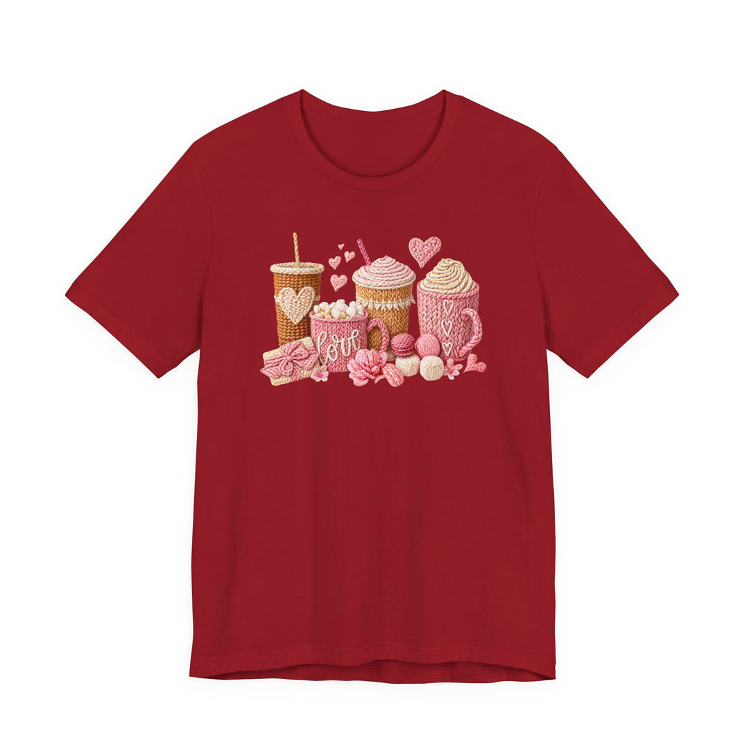 Coffee Love Tee features a playful, yarn-style illustration of cozy drinks and treats, creating a warm, hand-knit Valentine's Day vibe on a red T-shirt.