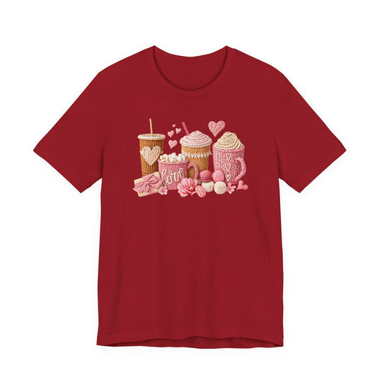 Coffee Love Tee features a playful, yarn-style illustration of cozy drinks and treats, creating a warm, hand-knit Valentine's Day vibe on a red T-shirt.