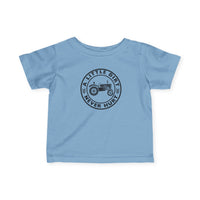 Light-blue toddler T-shirt with a tractor graphic and the phrase “A LITTLE DIRT NEVER HURT,” offering comfort and durability for young children.