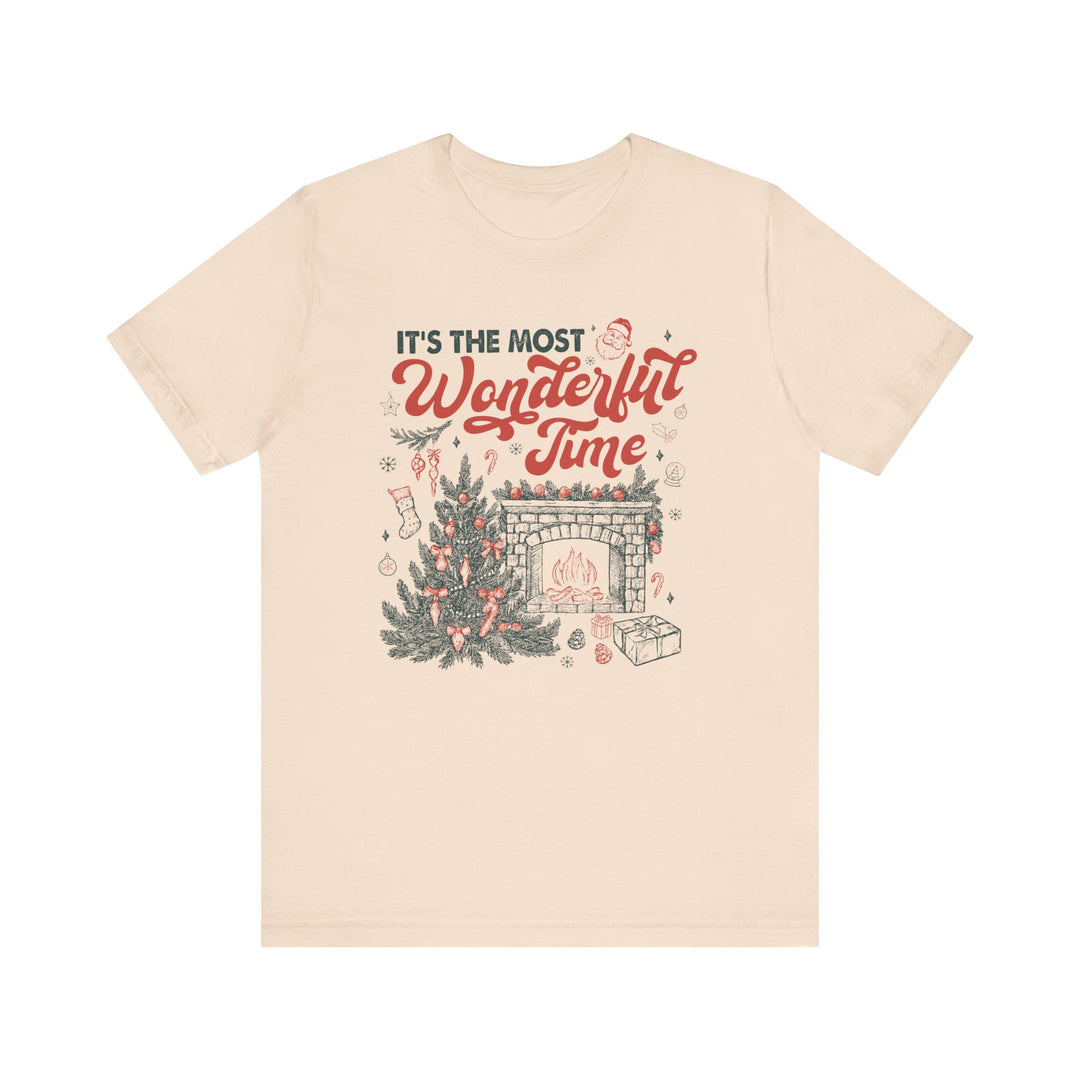 Most Wonderful Time of the Year Tee features a vintage holiday scene with a Christmas tree and fireplace, perfect for holiday enthusiasts seeking stylish, festive apparel.