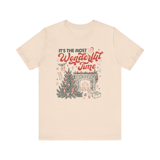 Most Wonderful Time of the Year Tee features a vintage holiday scene with a Christmas tree and fireplace, perfect for holiday enthusiasts seeking stylish, festive apparel.