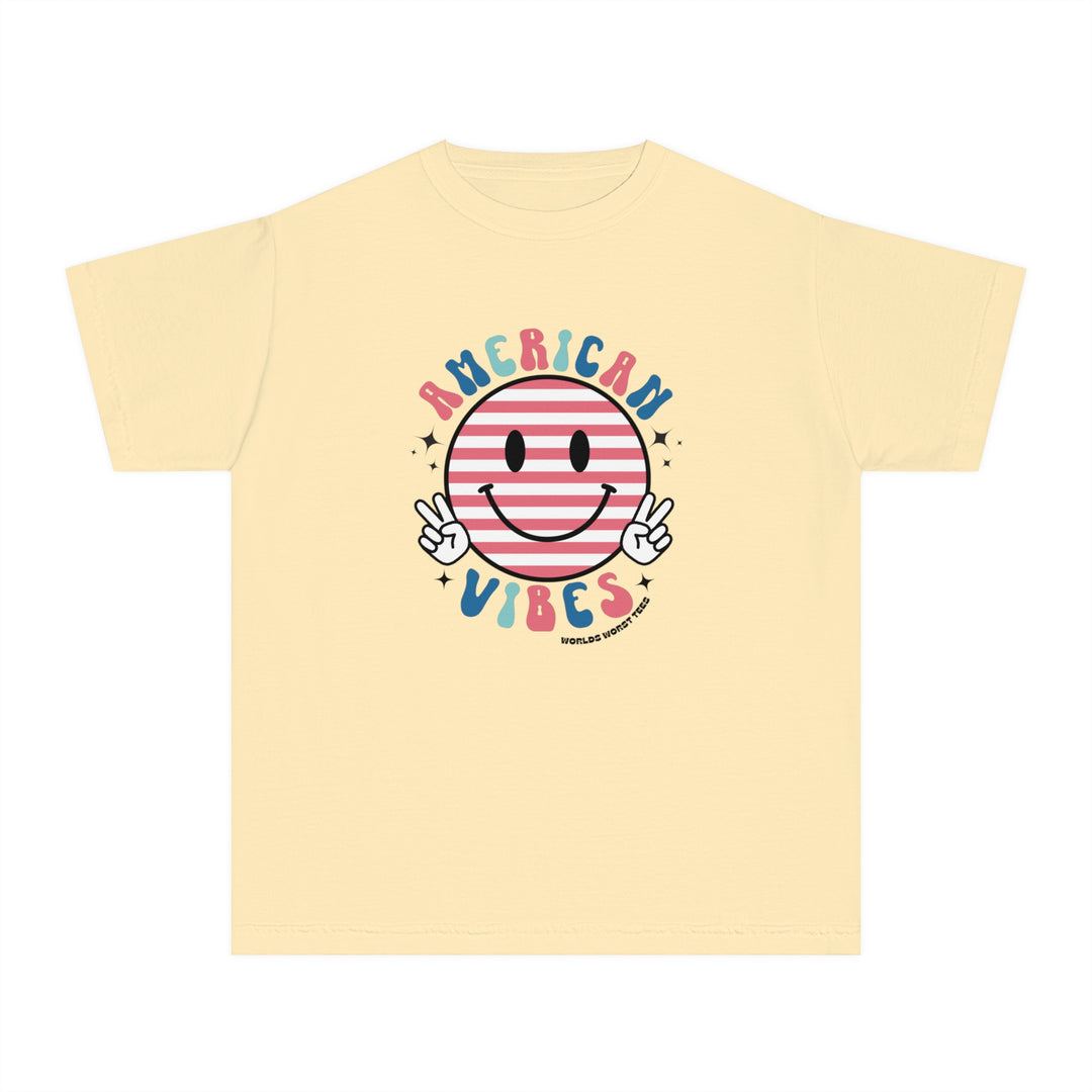 American Vibes Youth Tee: A yellow t-shirt featuring a smiley face and peace sign hands. Made of soft combed cotton for comfort and agility, perfect for kids on the go. Classic fit for all-day wear.