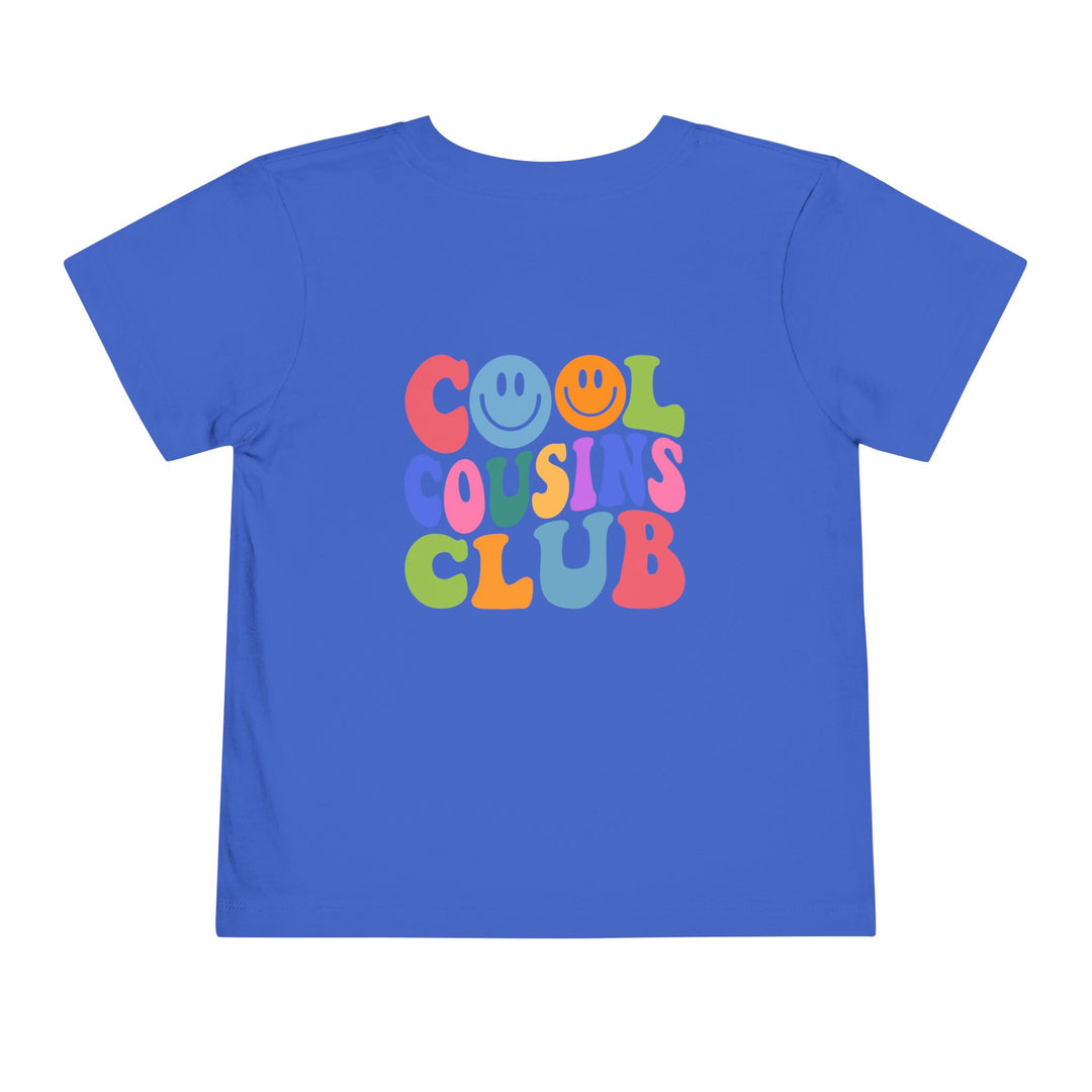 Cool Cousins Club Toddler Tee, a soft, 100% cotton shirt with a comfortable tear-away label, perfect for everyday wear by toddlers.