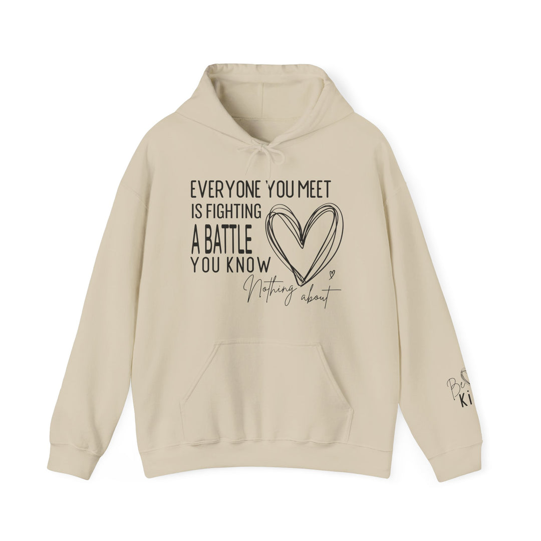 Cream-colored Fighting a Battle hoodie with hand-lettered black text and heart design, featuring Be kind on sleeve. Includes kangaroo pocket and drawstring hood.