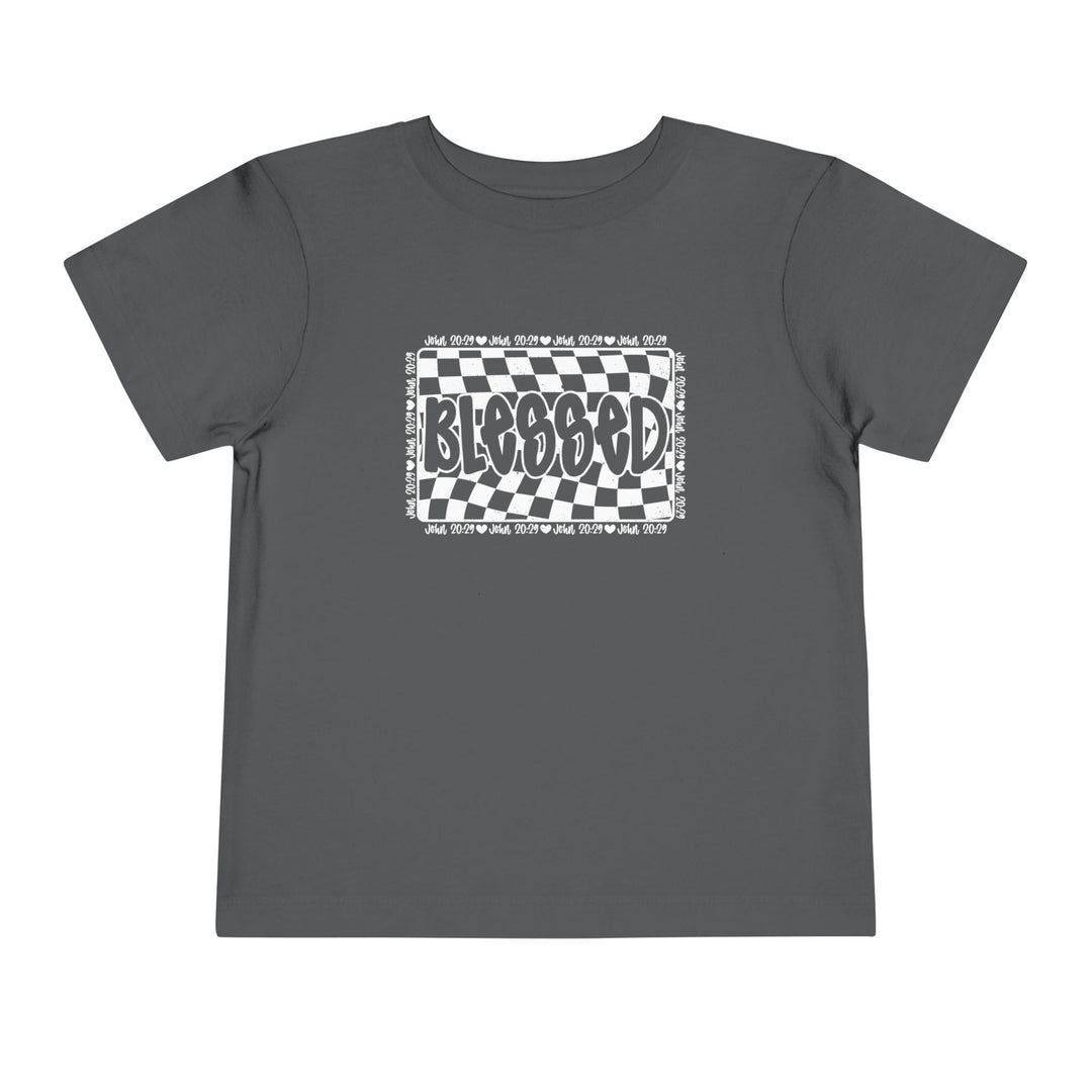 Blessed Toddler Tee: Grey t-shirt with a black and white checkered design, crafted from 100% Airlume cotton for comfort. Ideal for everyday wear.