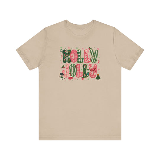 Holly Jolly Tee featuring festive red-and-green holiday graphics with HOLLY JOLLY text and seasonal illustrations, offering a soft, classic fit ideal for holiday wear.
